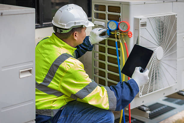 Professional Hvac technician working in Millbury, MA